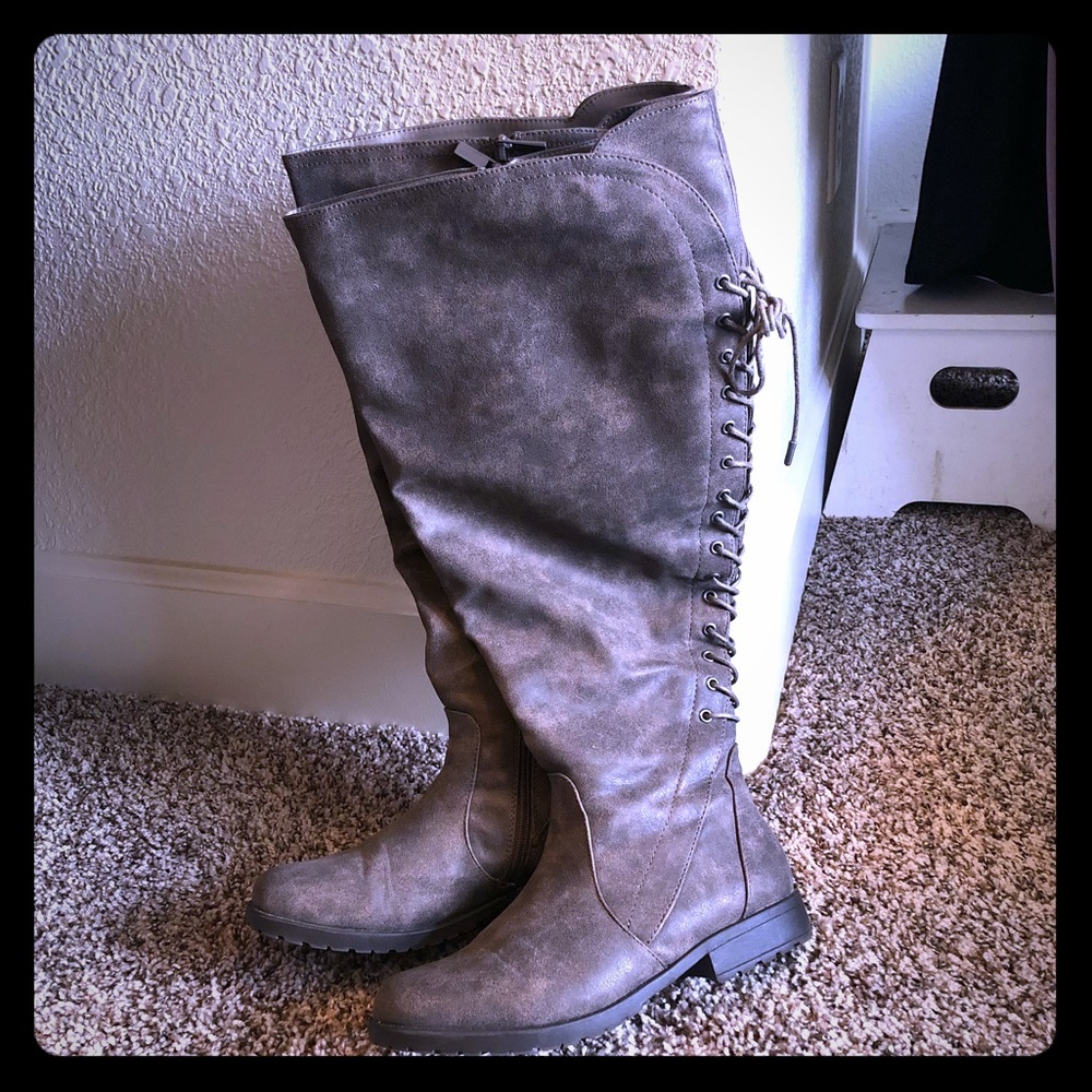 Zip up knee high boots with laces on back